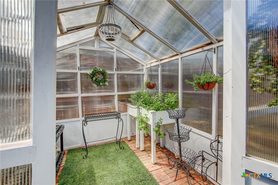 200 Carriage House Road Salado, TX 76571 - Photo 38 of 43 a view of a chair and table in backyard of the house