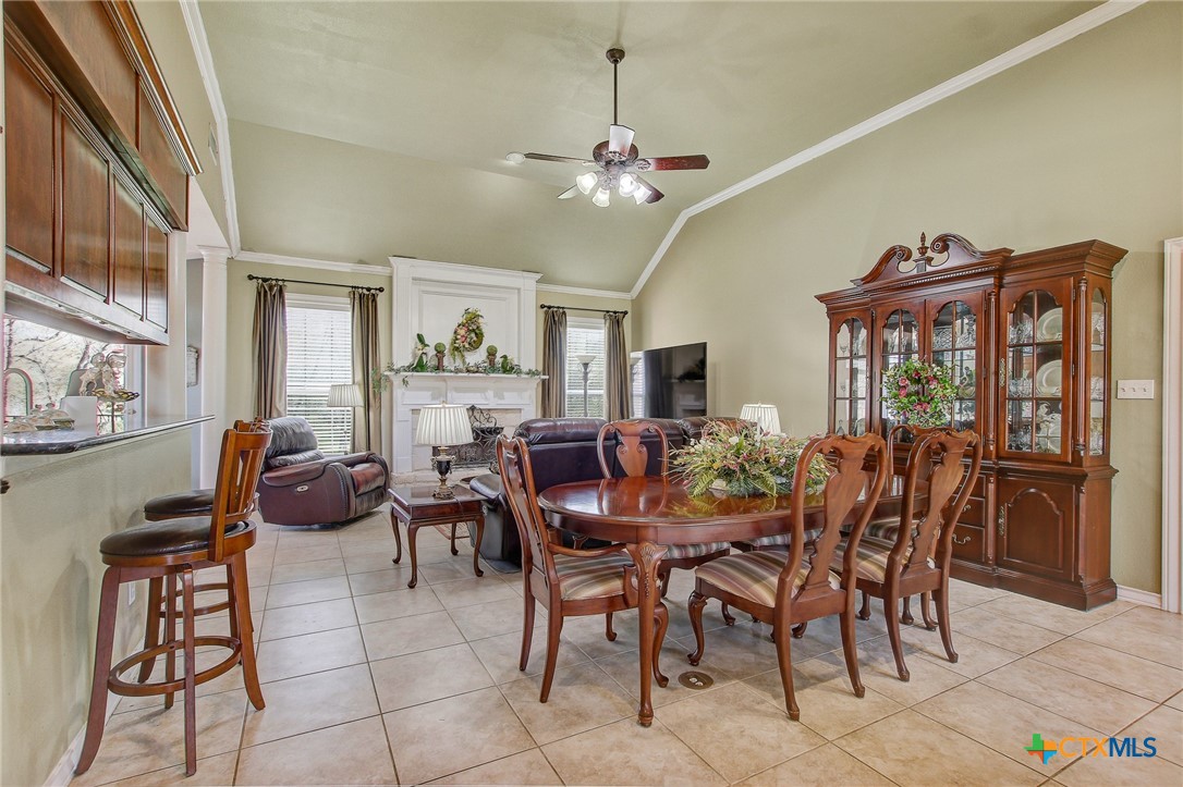 200 Carriage House Road Salado, TX 76571 - Photo 7 of 43 a view of a dining room with furniture window and wooden floor