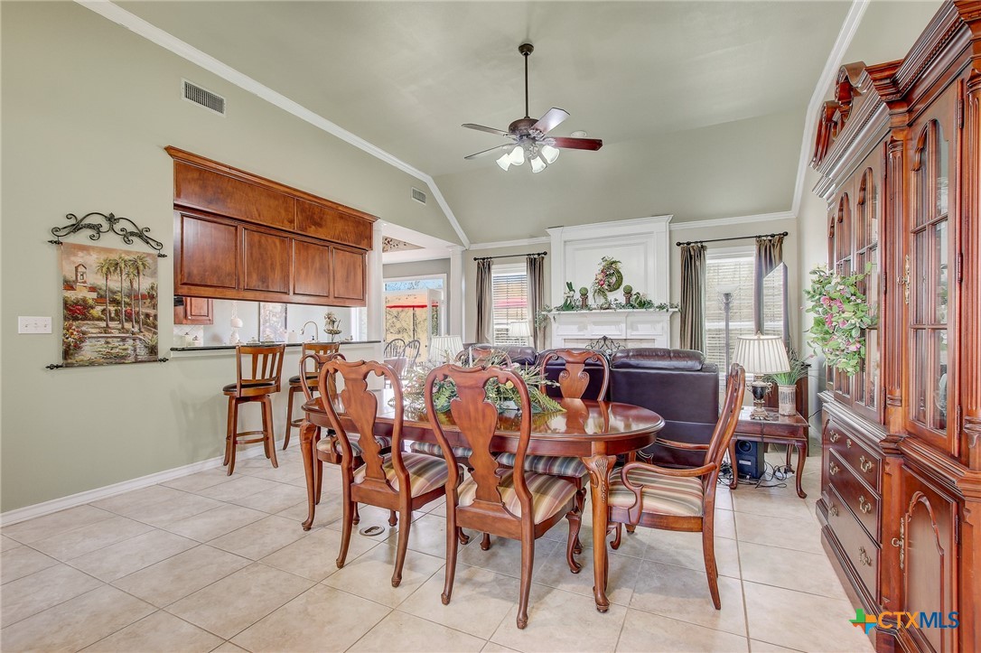 200 Carriage House Road Salado, TX 76571 - Photo 8 of 43 a view of a dining room with furniture window and wooden floor