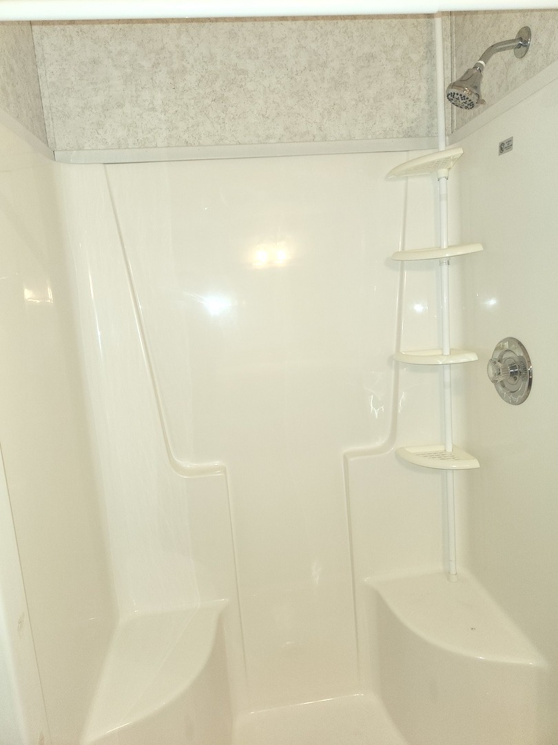 1027 Cherry Street Manteno, IL 60950 - Photo 12 of 20 a bathroom with a shower