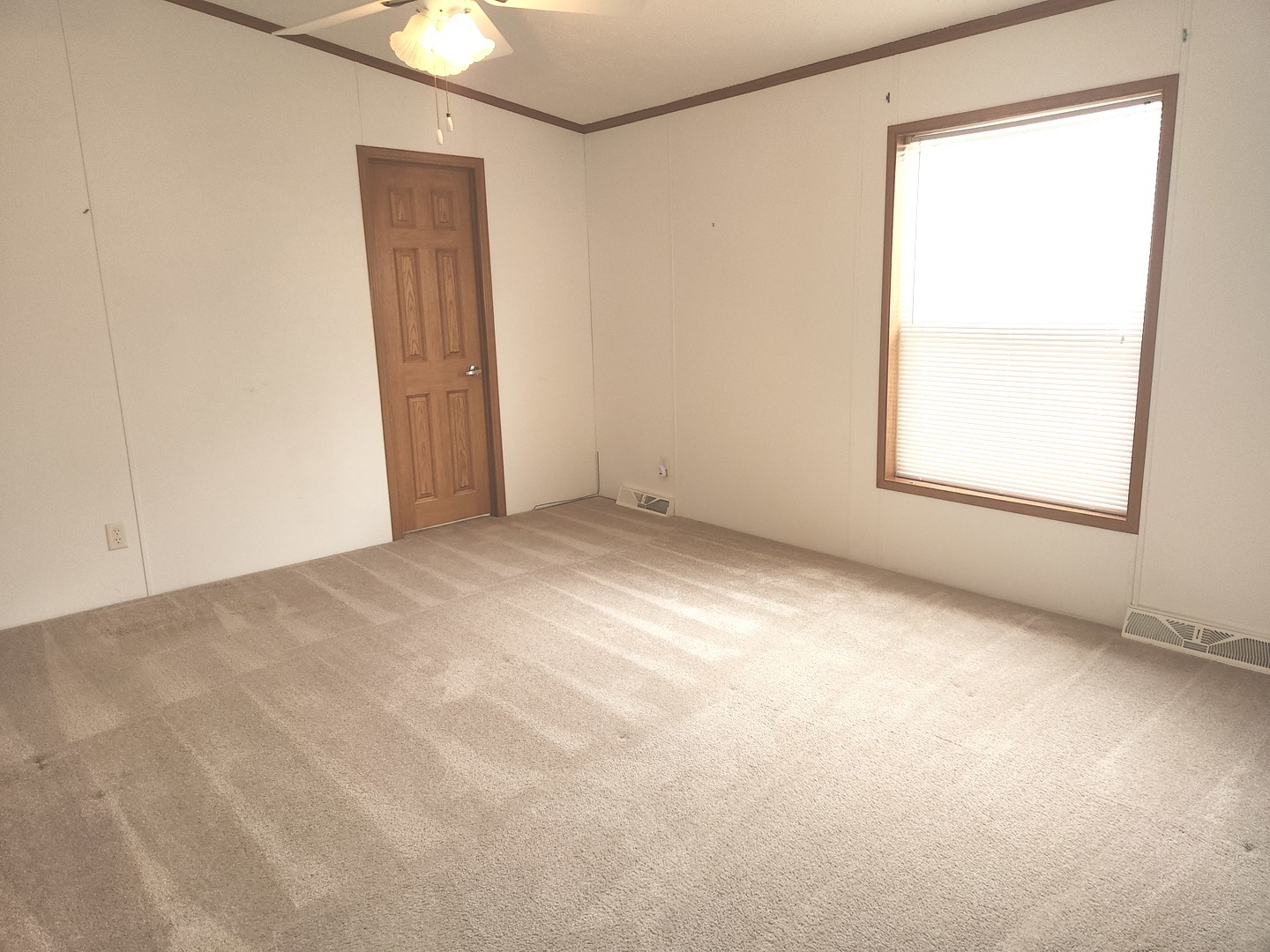 1027 Cherry Street Manteno, IL 60950 - Photo 13 of 20 an empty room with a window