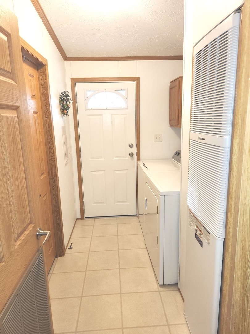 1027 Cherry Street Manteno, IL 60950 - Photo 18 of 20 a bathroom with a sink a toilet and shower