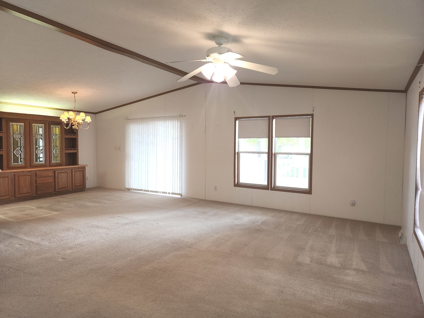 1027 Cherry Street Manteno, IL 60950 - Photo 4 of 20 a view of an empty room with a window