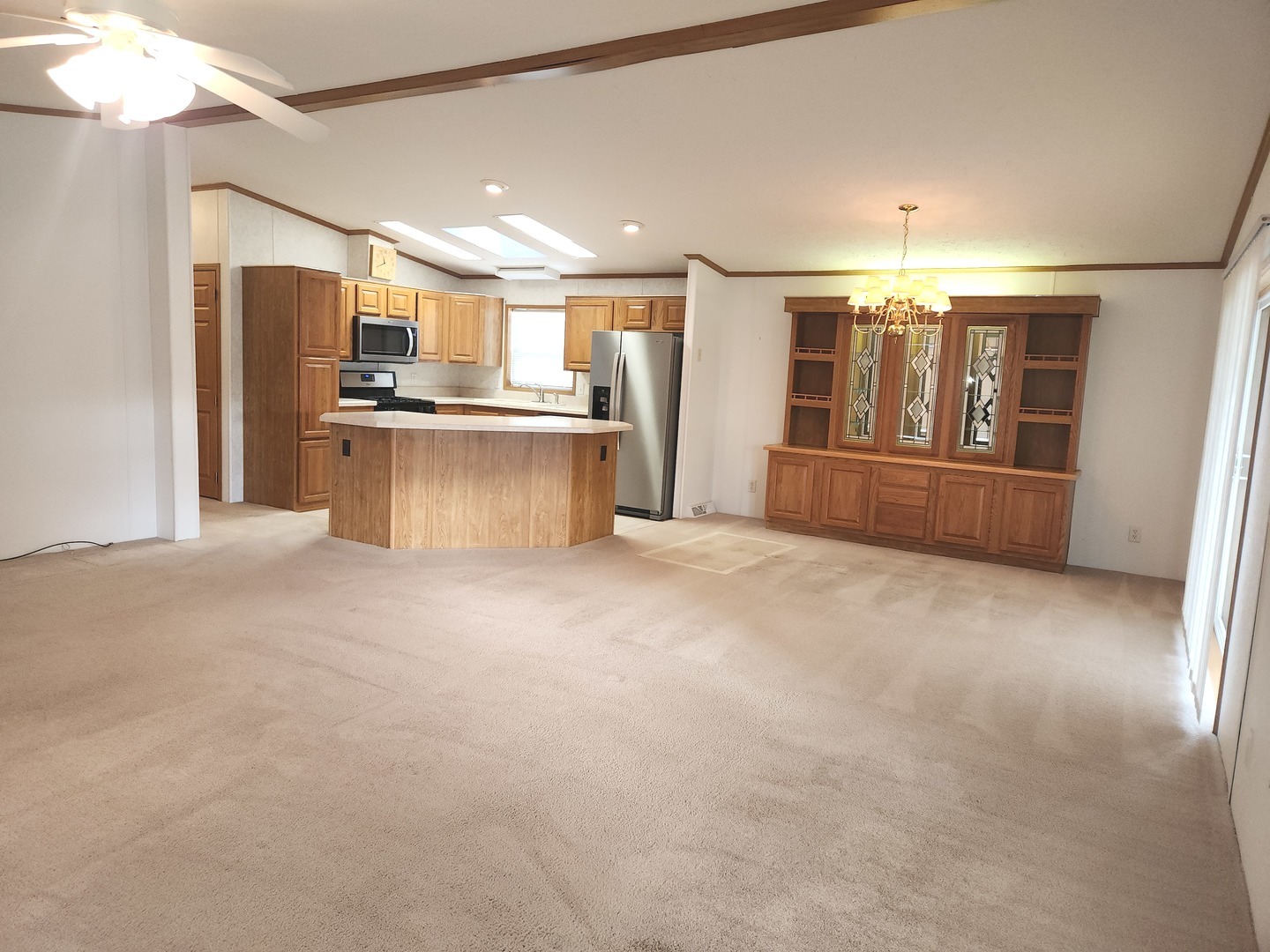 1027 Cherry Street Manteno, IL 60950 - Photo 6 of 20 a view of kitchen with refrigerator and window