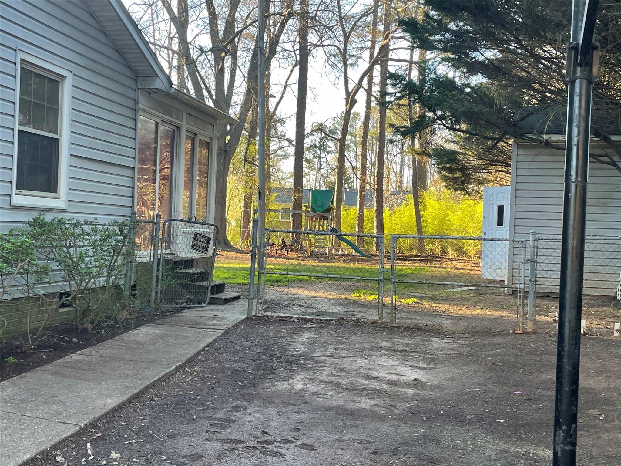 4631 Benfield Road Gastonia, NC 28056 - Photo 4 of 14 a view of a park with large trees