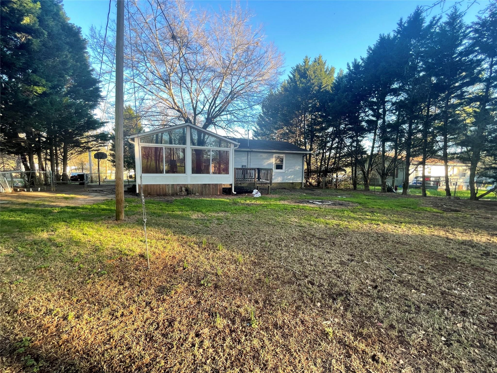 4631 Benfield Road Gastonia, NC 28056 - Photo 5 of 14 a view of a house with a yard