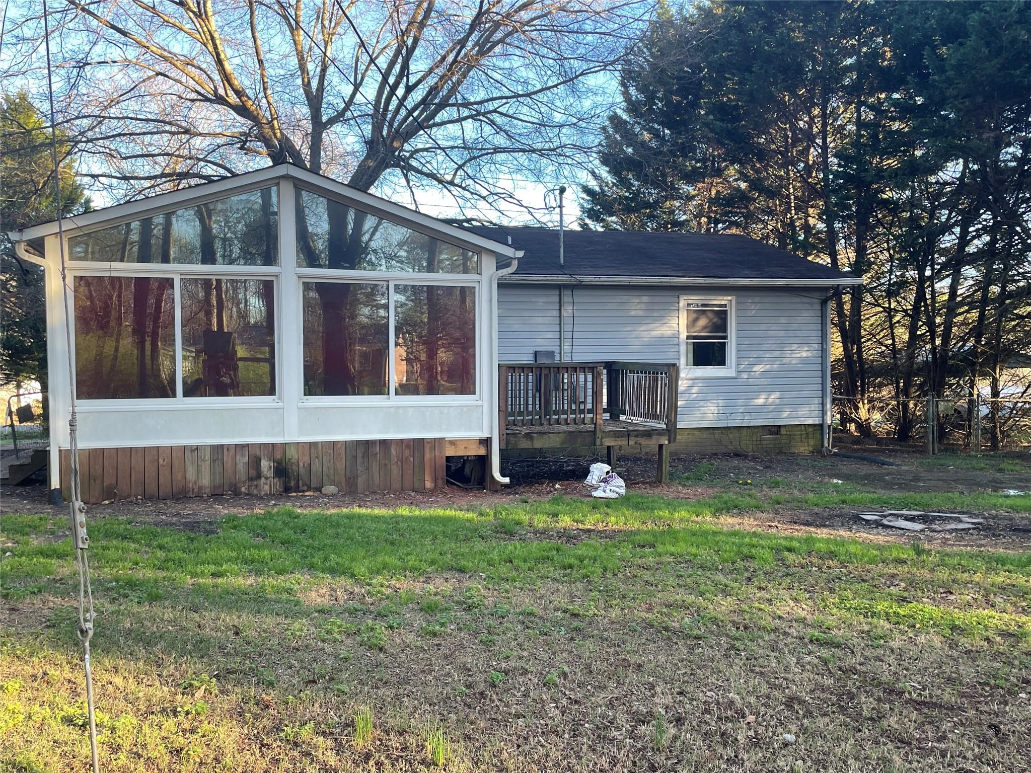 4631 Benfield Road Gastonia, NC 28056 - Photo 6 of 14 a view of house with backyard and a tree