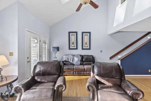 a bedroom with bed and a couch