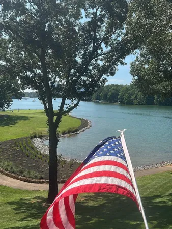 a spacious bathroom with a double vanity sink and a mirror