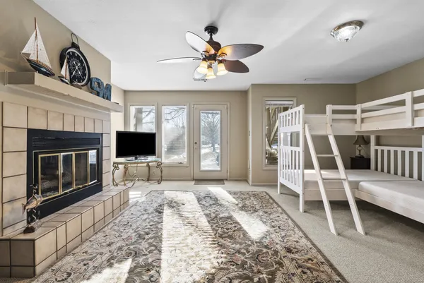 a view of a deck with mountain view and wooden floor