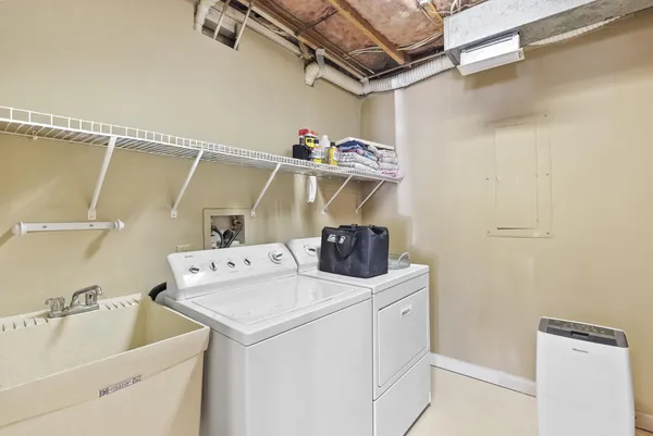 a view of a lake with couches