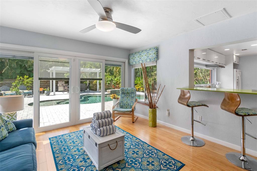 680 41st Street Sarasota, FL 34234 - Photo 18 of 42 a living room with furniture and a potted plant