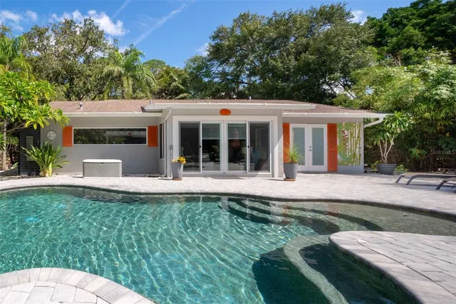 a outdoor dining space with furniture and outdoor view