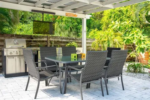 a view of balcony with furniture