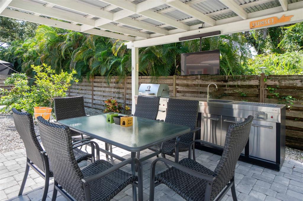 680 41st Street Sarasota, FL 34234 - Photo 38 of 42 a outdoor dining space with furniture and outdoor view