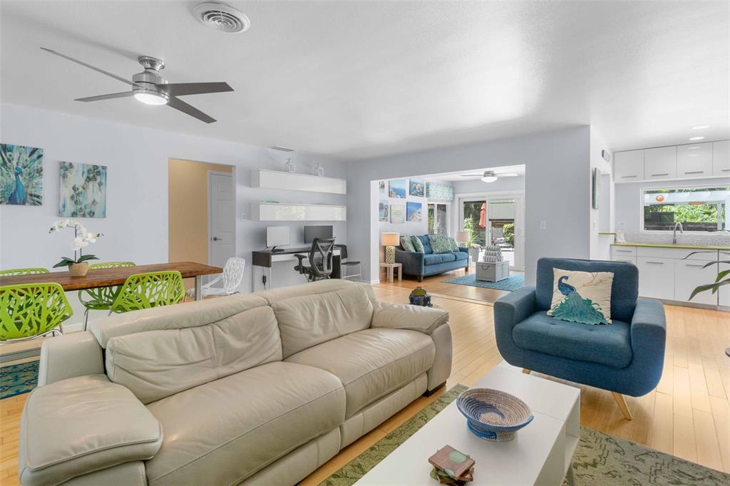 680 41st Street Sarasota, FL 34234 - Photo 6 of 42 a living room with furniture and a table