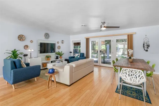 a living room with furniture and a rug