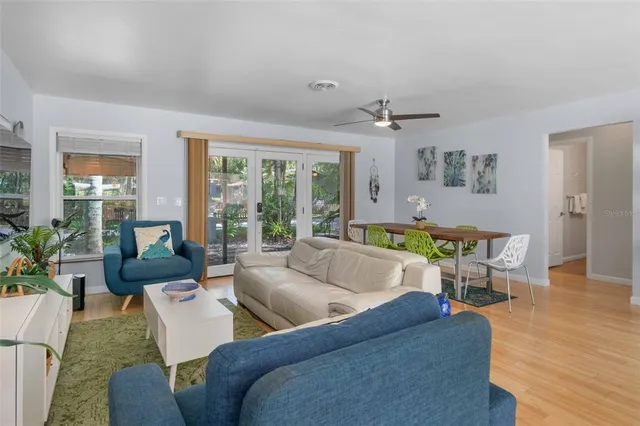 a kitchen with a sink window and cabinets