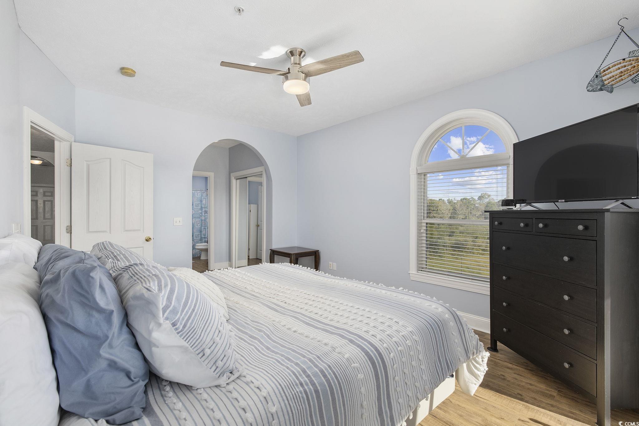 131 Waypoint Ridge Avenue, Unit Q28 Little River, SC 29566 - Photo 14 of 36 Bedroom with ceiling fan and hardwood / wood-style