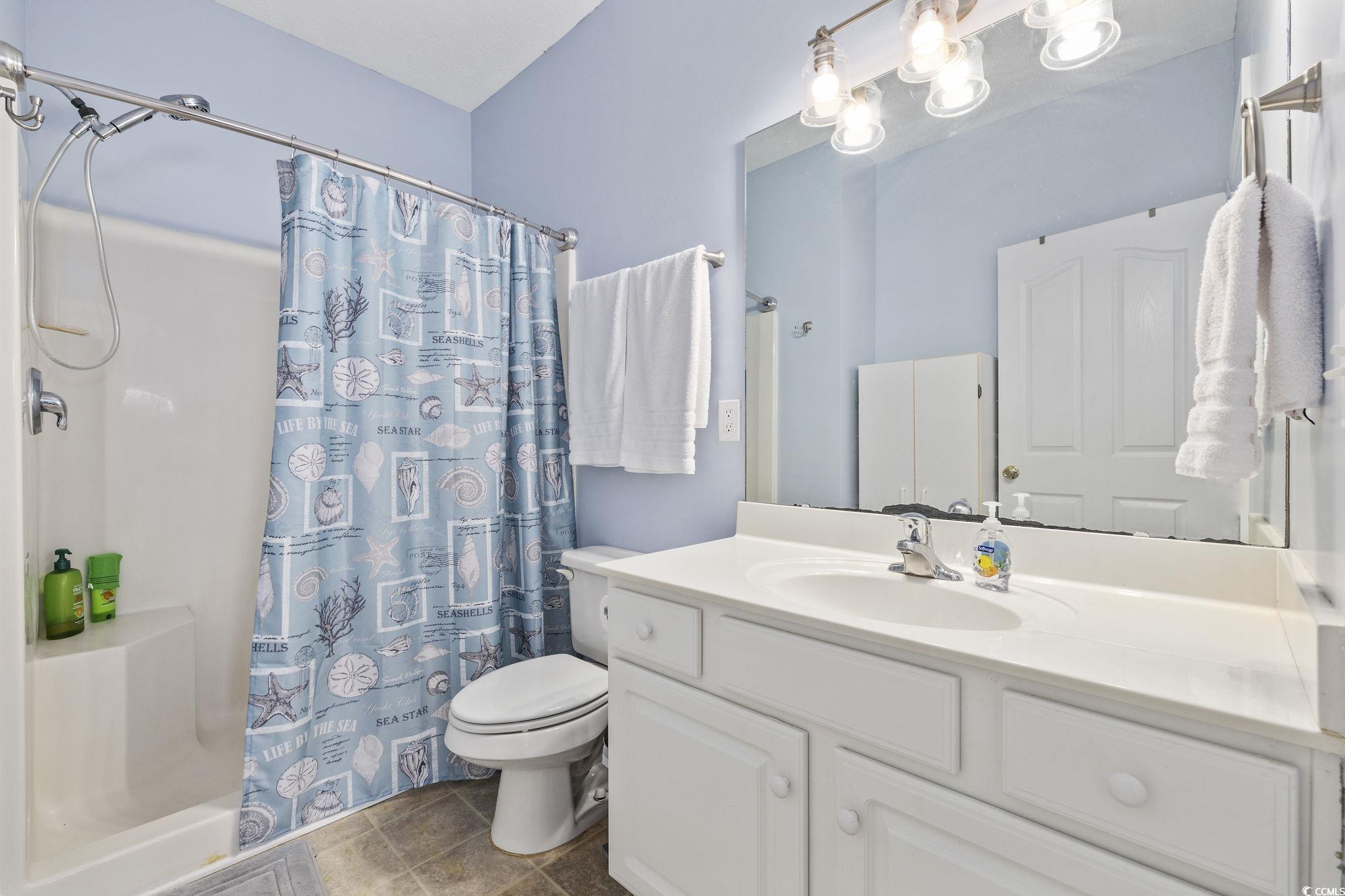 131 Waypoint Ridge Avenue, Unit Q28 Little River, SC 29566 - Photo 17 of 36 Bathroom featuring tile patterned flooring, toilet