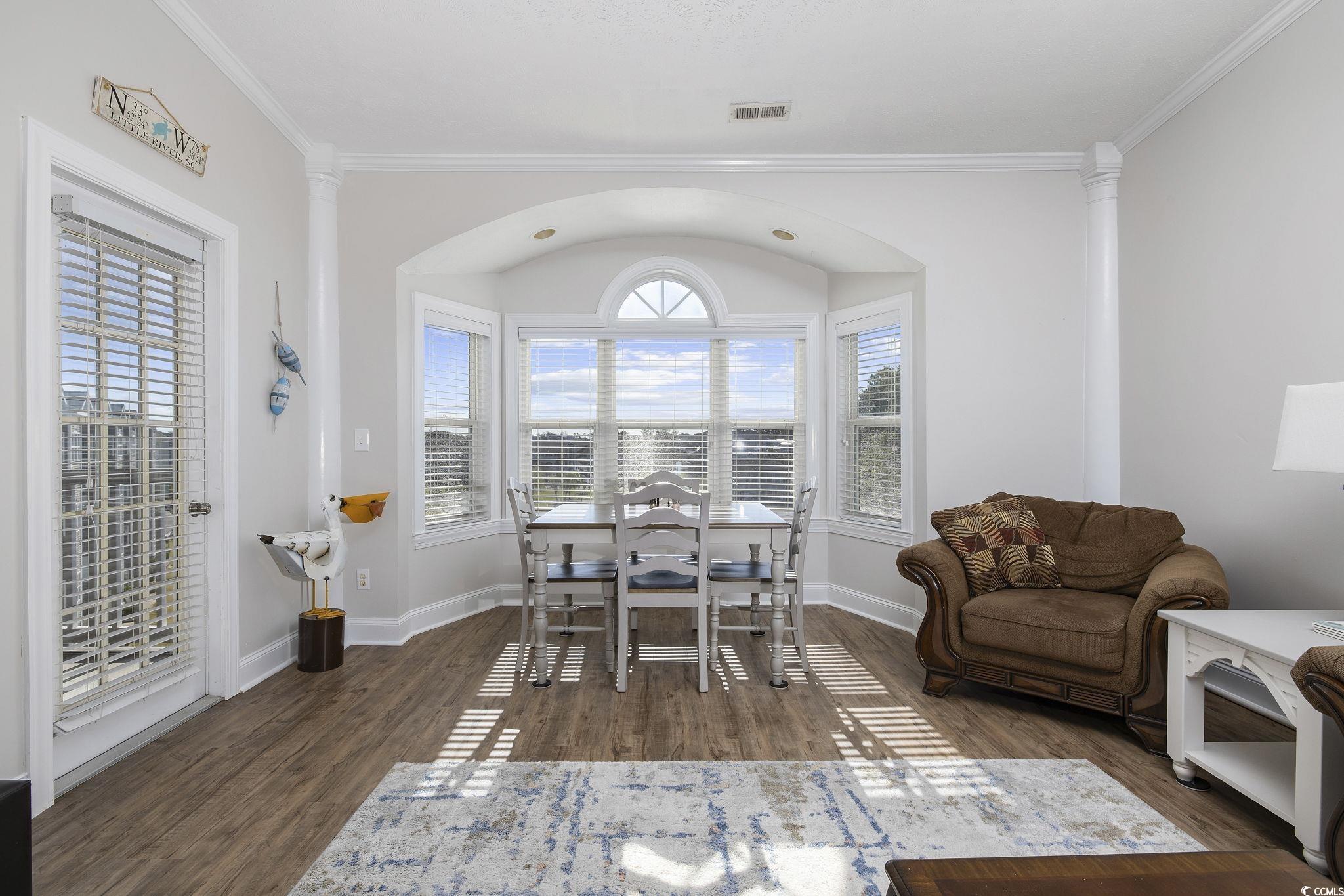 131 Waypoint Ridge Avenue, Unit Q28 Little River, SC 29566 - Photo 6 of 36 Dining space with ornamental molding, ornate colum
