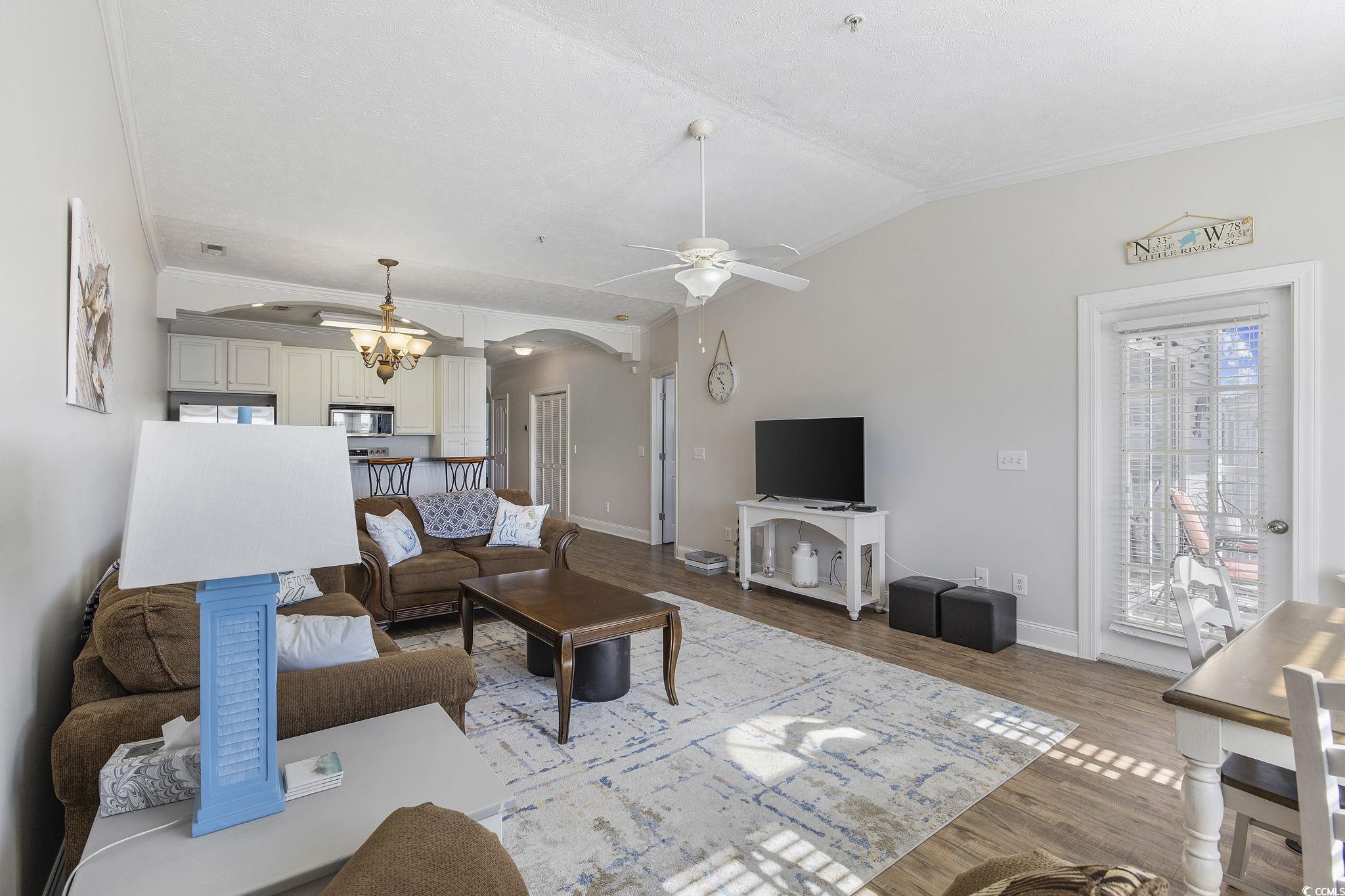 131 Waypoint Ridge Avenue, Unit Q28 Little River, SC 29566 - Photo 9 of 36 Living room featuring ceiling fan with notable cha