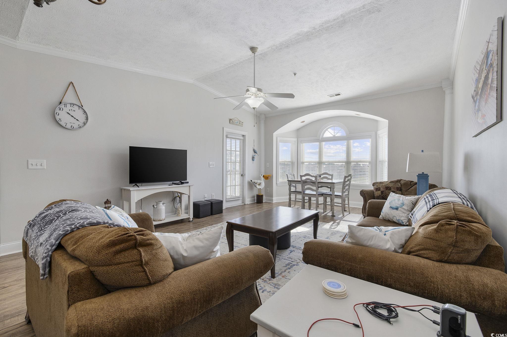 131 Waypoint Ridge Avenue, Unit Q28 Little River, SC 29566 - Photo 10 of 36 Living room featuring light wood-type flooring, ce
