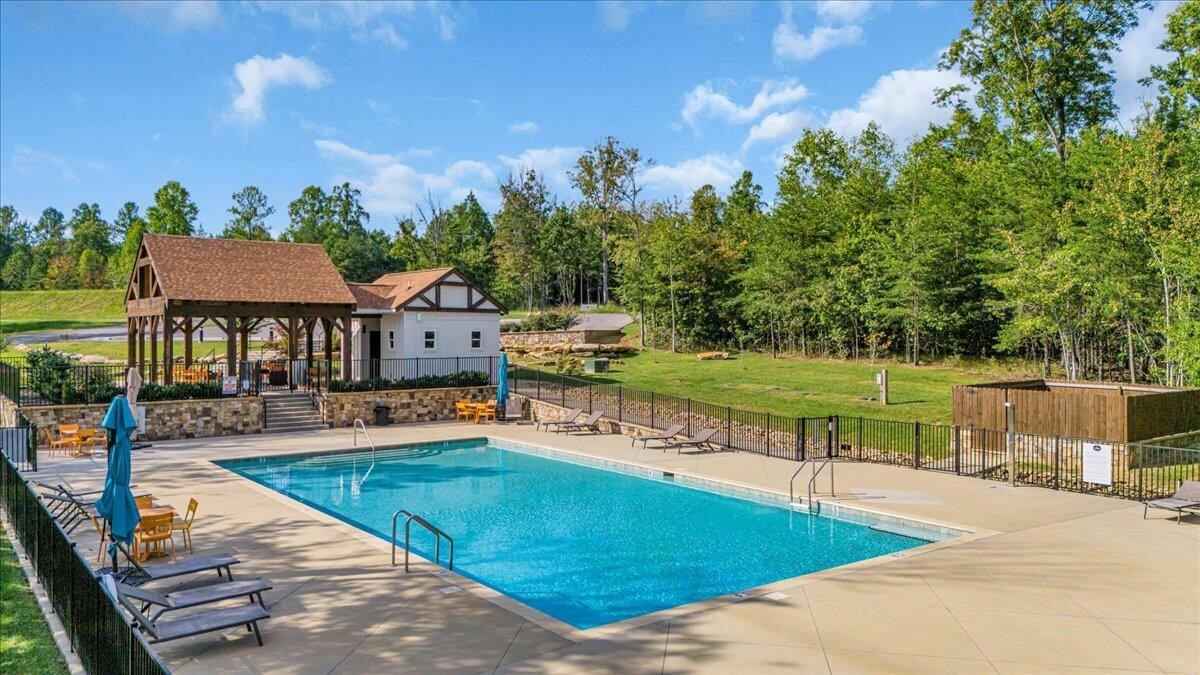 0 Cherokee Path Jasper, TN 37347 - Photo 22 of 31 a view of a house with swimming pool and sitting area