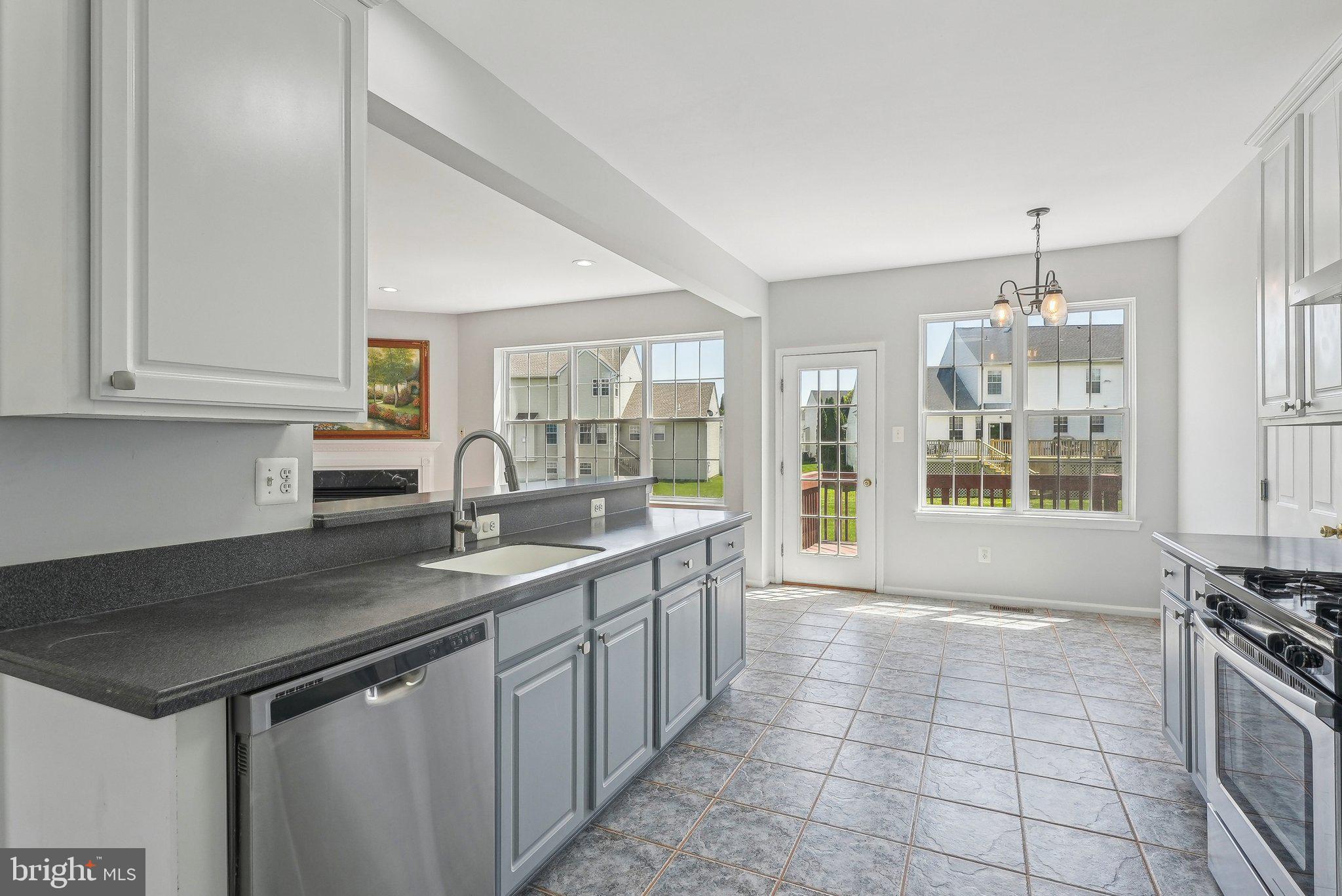 25 Keswick Road East Windsor, NJ 08520 - Photo 11 of 41 a kitchen with a sink and cabinets