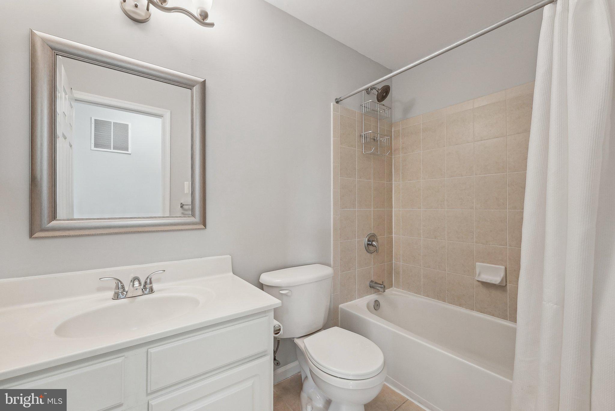 25 Keswick Road East Windsor, NJ 08520 - Photo 20 of 41 a bathroom with a sink toilet and shower