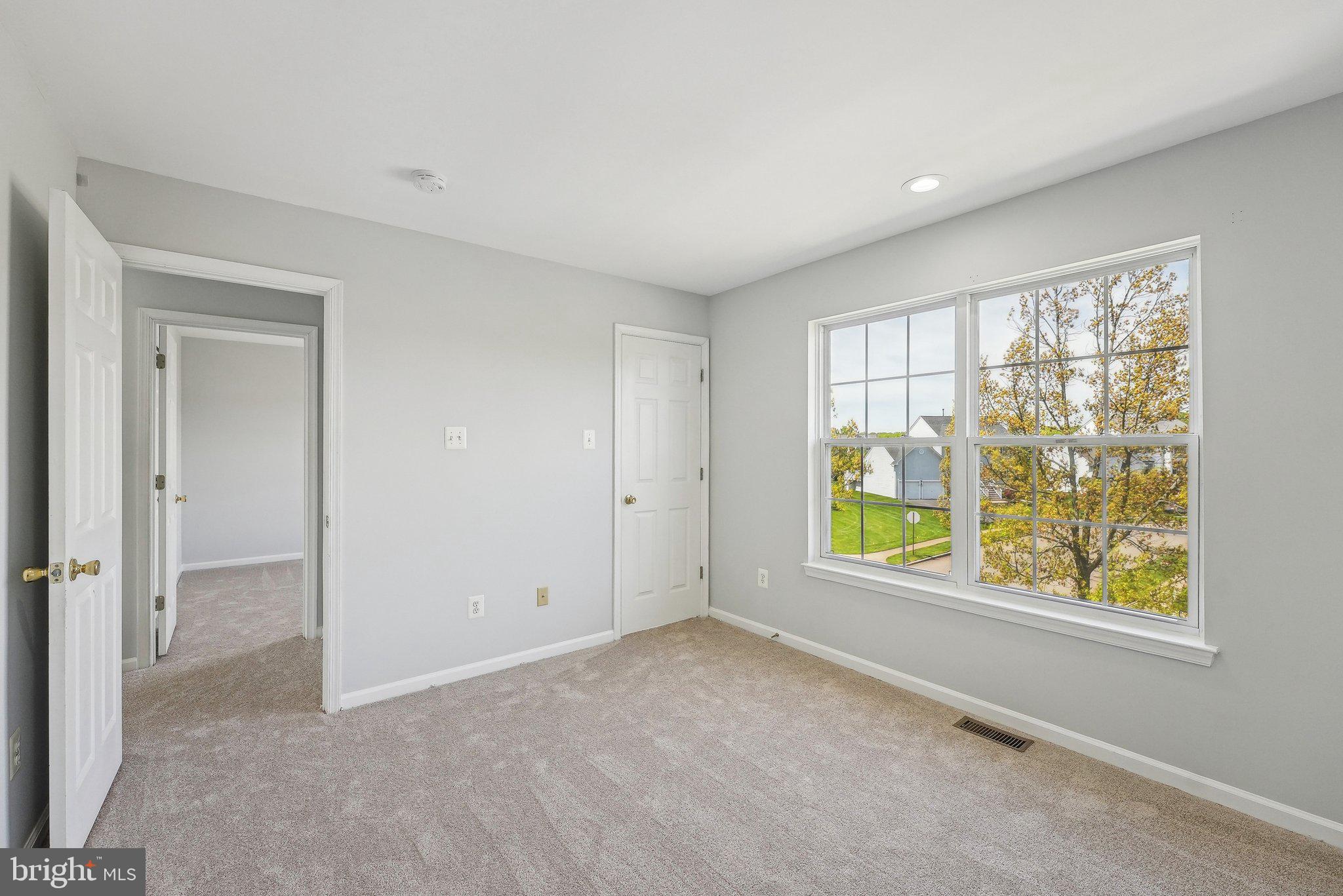 25 Keswick Road East Windsor, NJ 08520 - Photo 21 of 41 a view of an empty room with a window