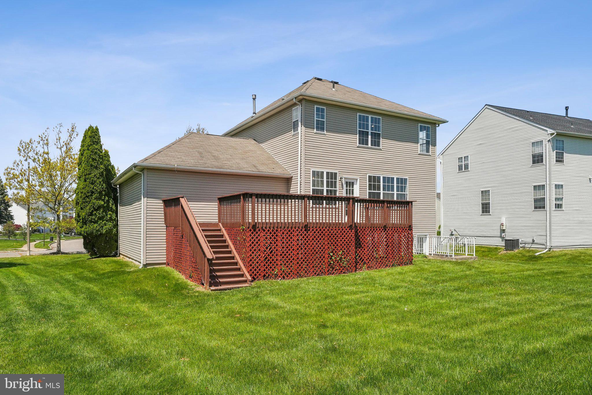 25 Keswick Road East Windsor, NJ 08520 - Photo 28 of 41 a front view of house with yard and green space