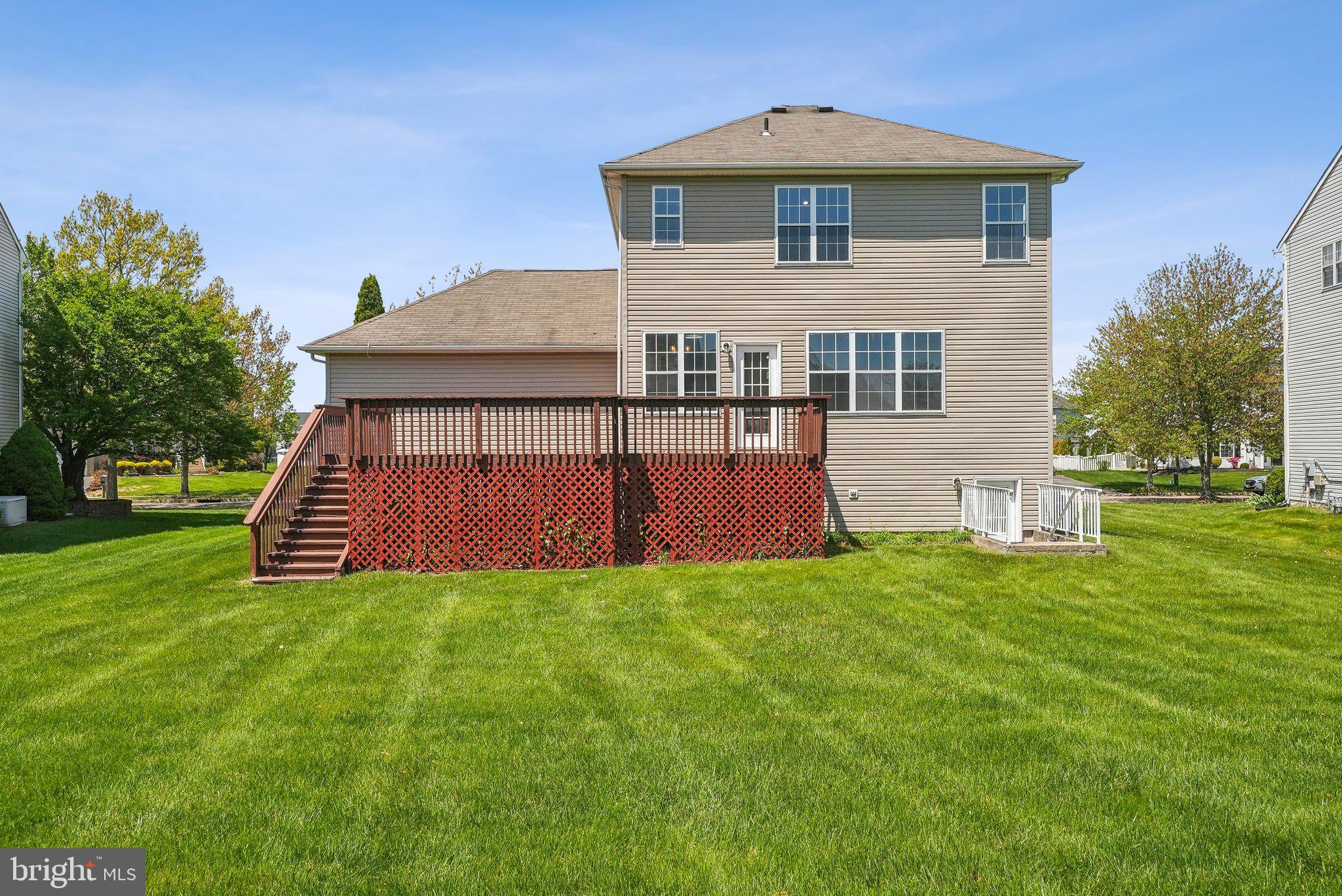 25 Keswick Road East Windsor, NJ 08520 - Photo 29 of 41 a front view of a house with a yard