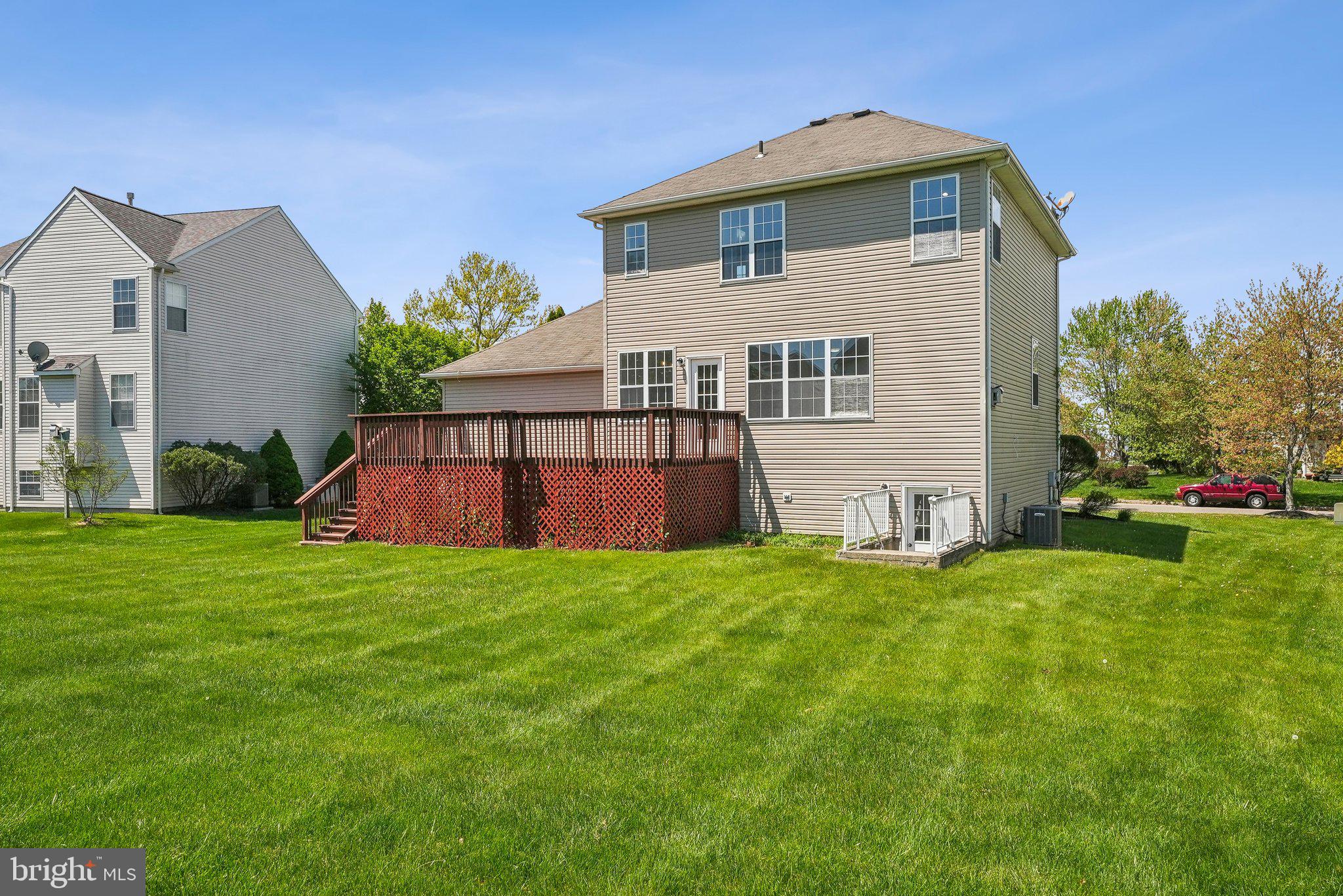 25 Keswick Road East Windsor, NJ 08520 - Photo 30 of 41 a house that has garden in front of it