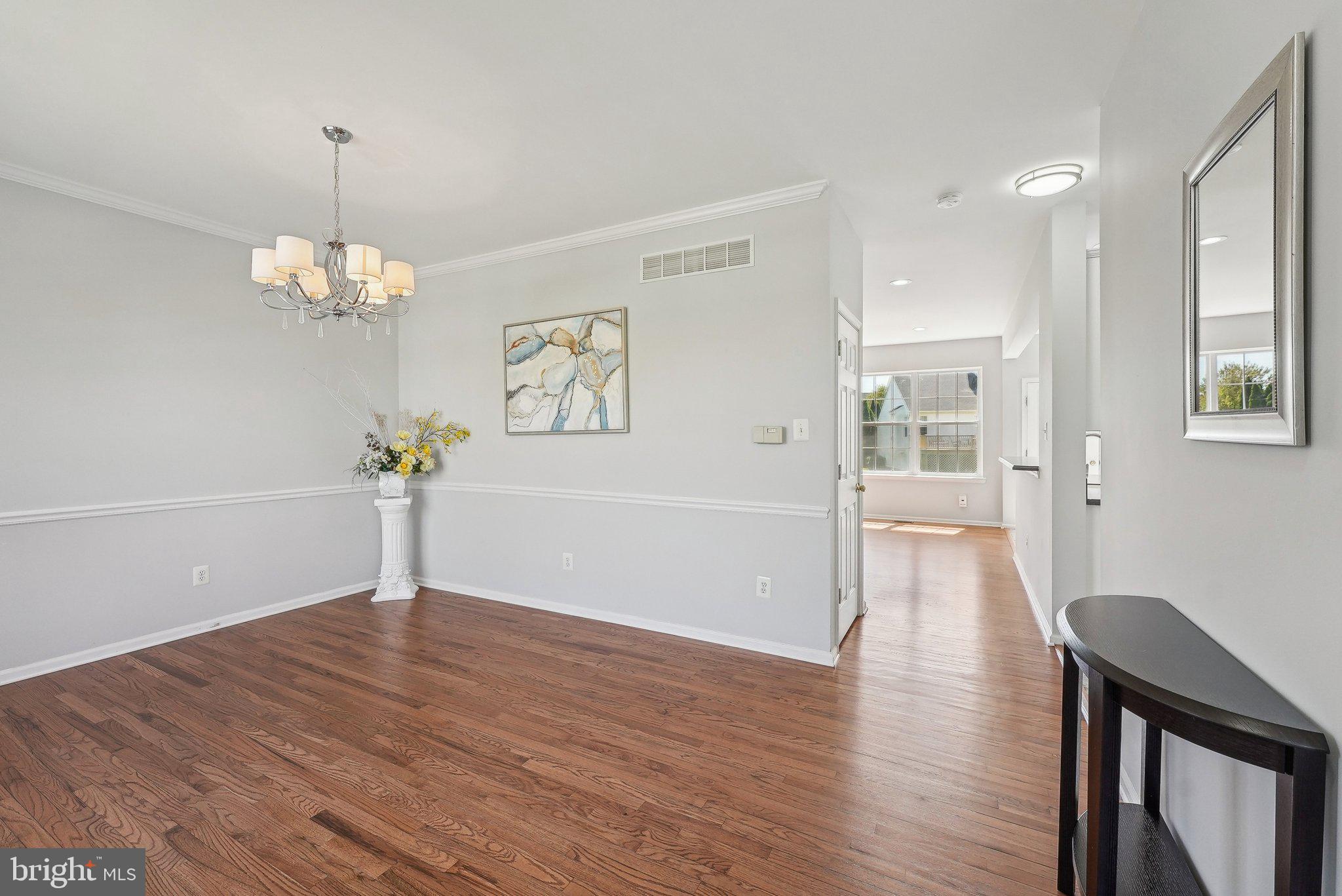 25 Keswick Road East Windsor, NJ 08520 - Photo 3 of 41 a view of a room with wooden floor and window
