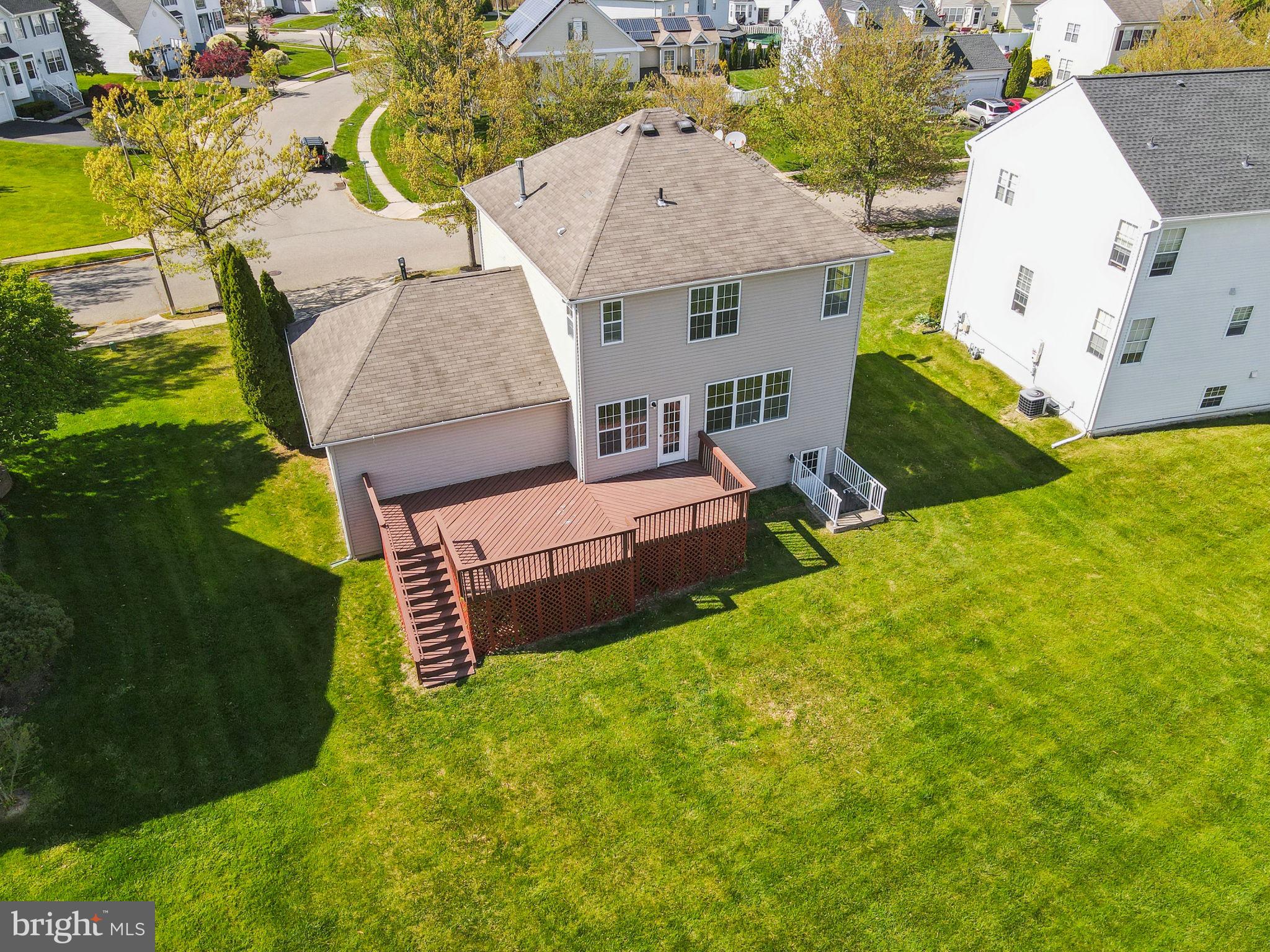 25 Keswick Road East Windsor, NJ 08520 - Photo 37 of 41 an aerial view of a house with garden space and street view