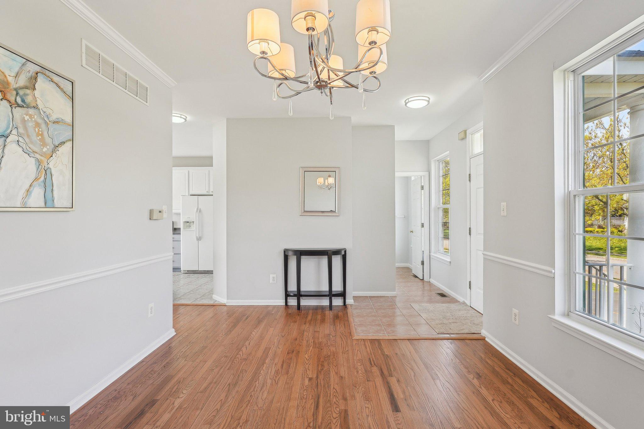 25 Keswick Road East Windsor, NJ 08520 - Photo 5 of 41 a view of empty room with wooden floor and fan