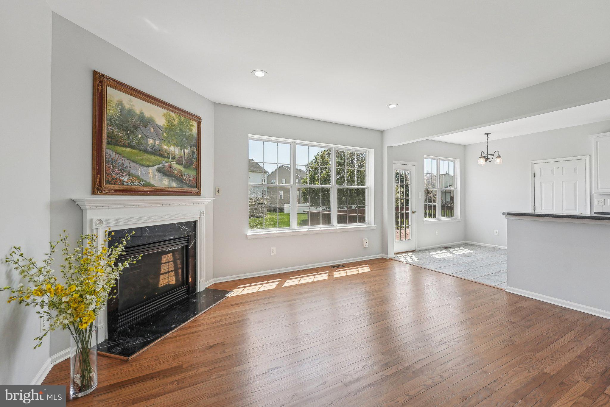 25 Keswick Road East Windsor, NJ 08520 - Photo 7 of 41 a view of an empty room with wooden floor and a window