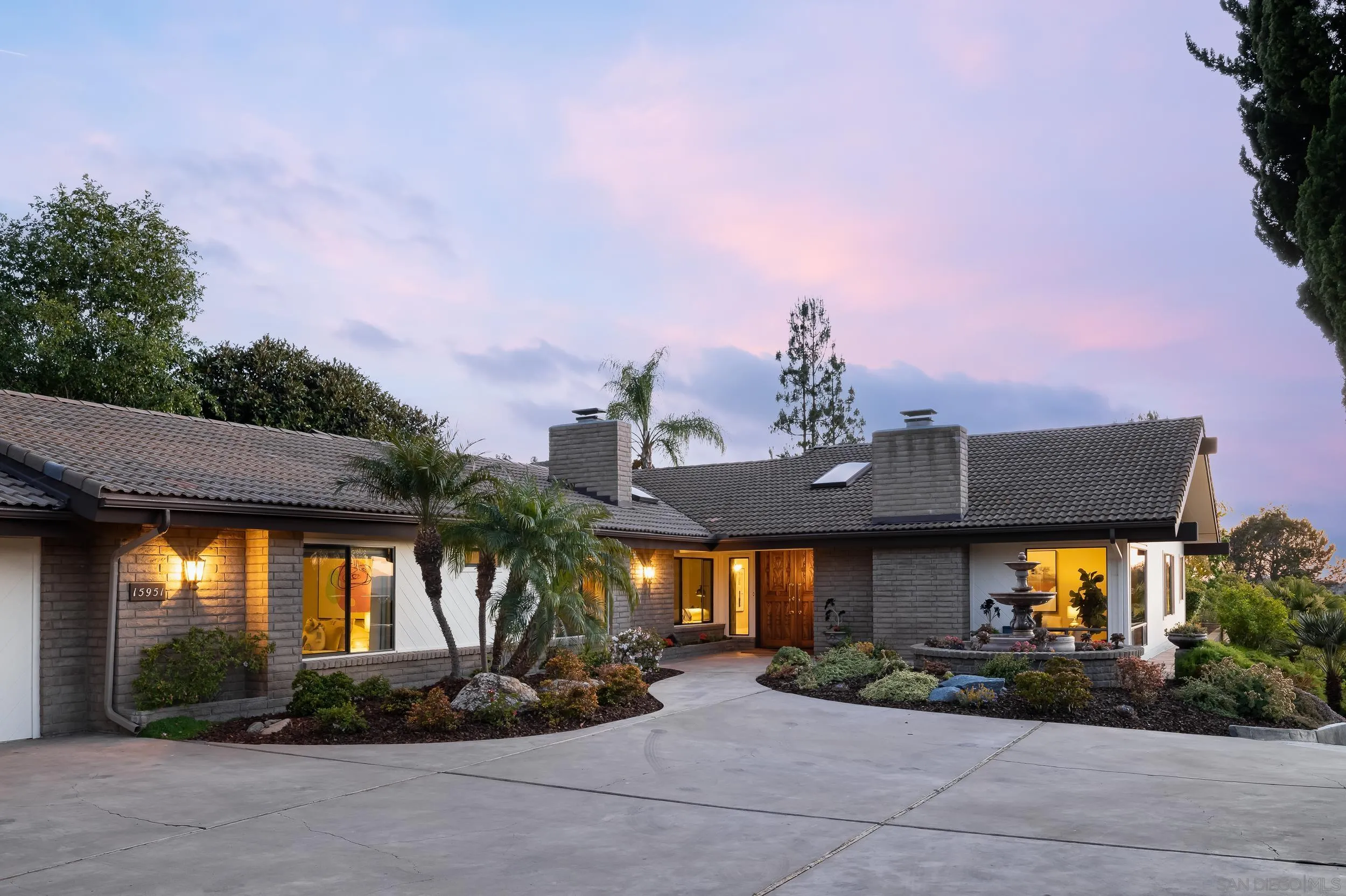 15951 Lime Grove Road Poway, CA 92064 - Photo 2 of 52 a front view of a house with a yard
