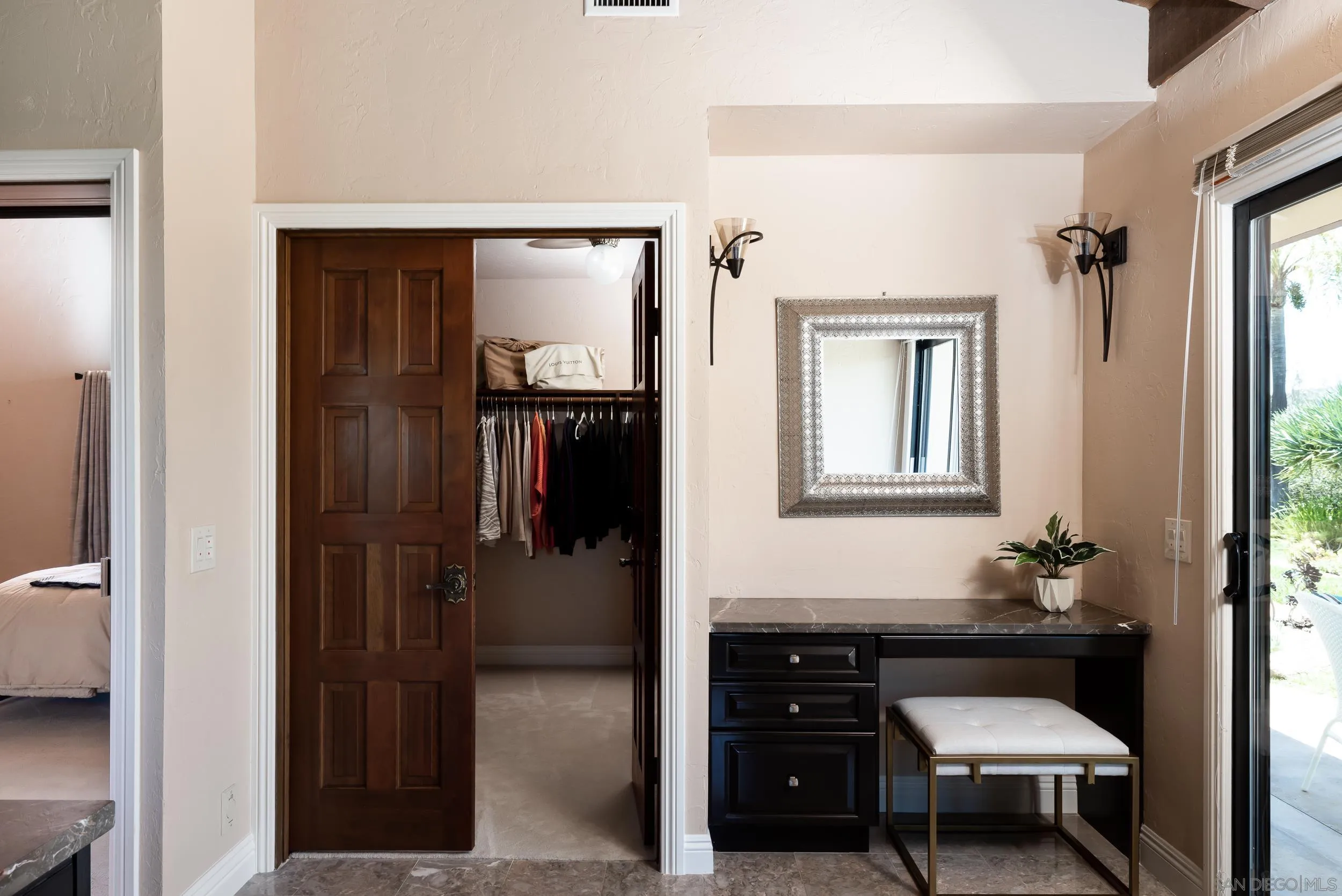 15951 Lime Grove Road Poway, CA 92064 - Photo 21 of 52 a bathroom with a sink a mirror and a toilet