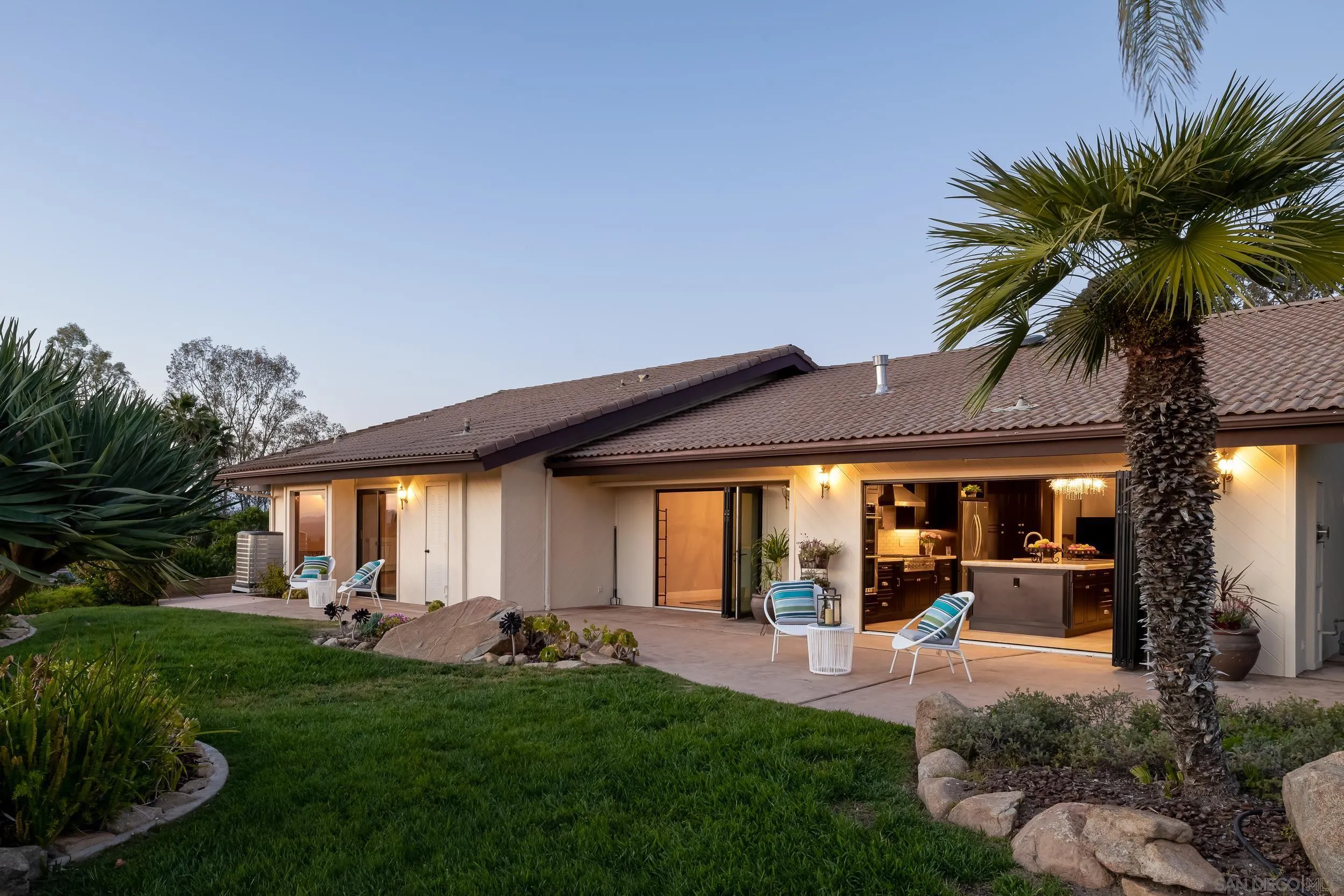15951 Lime Grove Road Poway, CA 92064 - Photo 3 of 52 a view of a house with backyard porch and sitting area