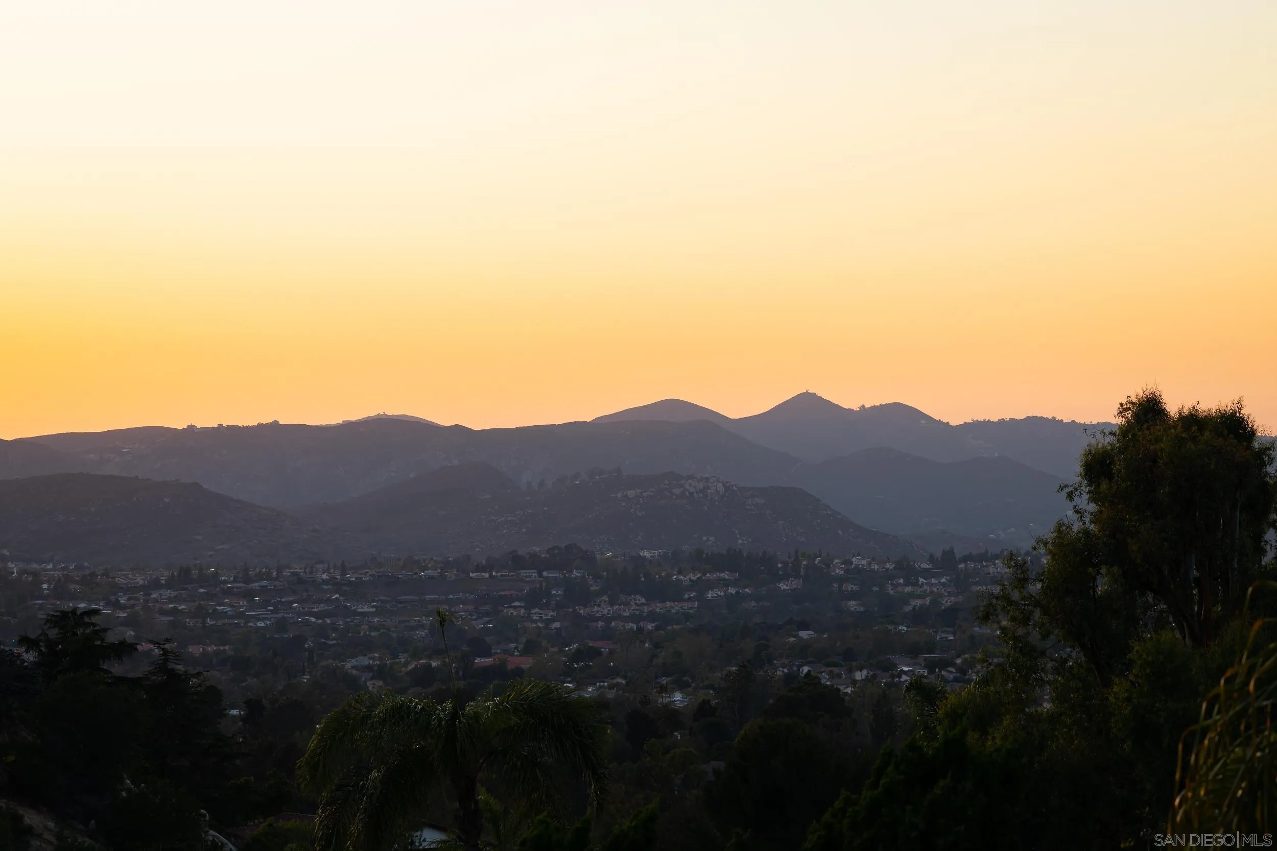 15951 Lime Grove Road Poway, CA 92064 - Photo 41 of 52 a view of a house with a street