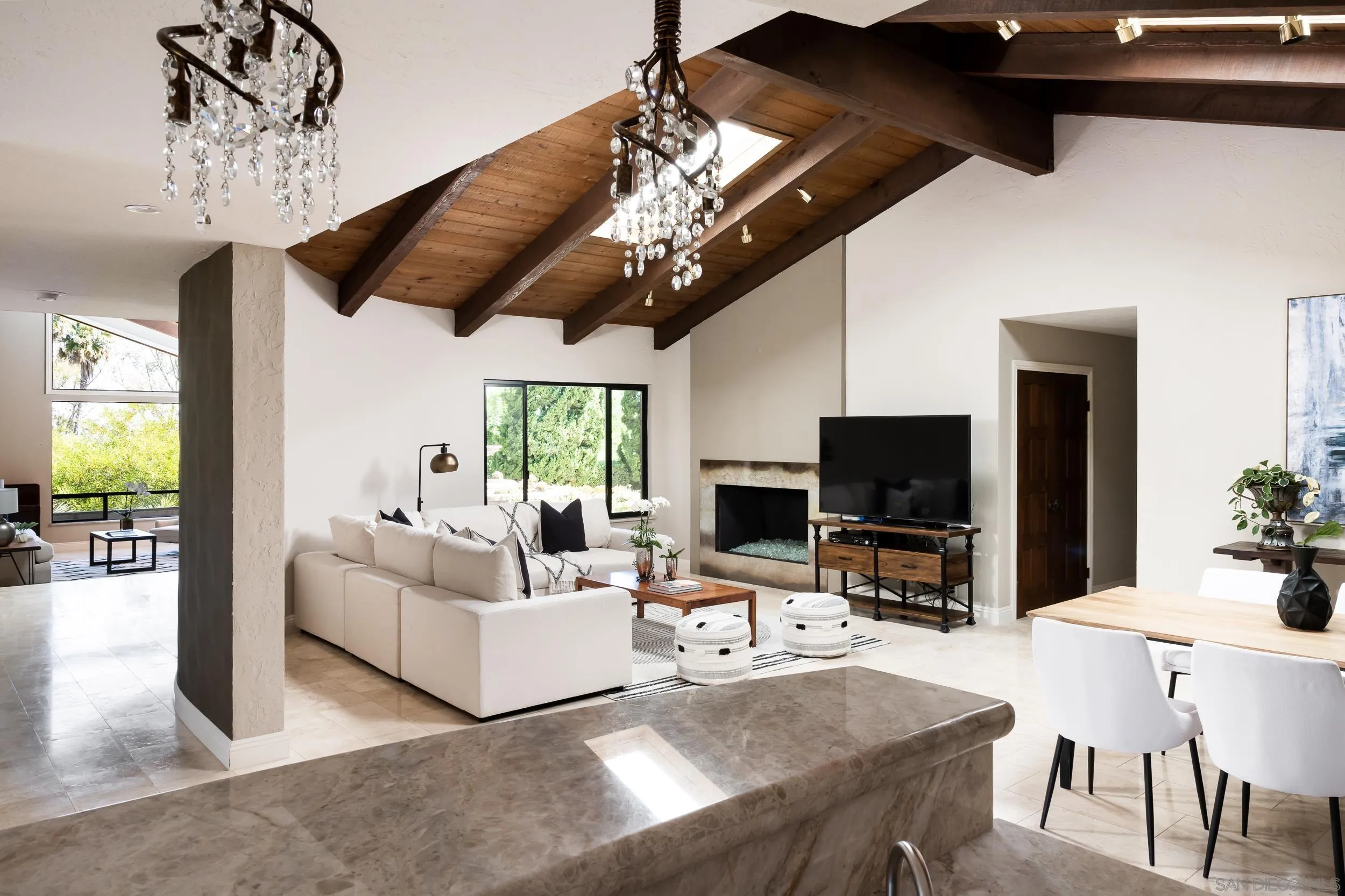 15951 Lime Grove Road Poway, CA 92064 - Photo 8 of 52 a living room with furniture a flat screen tv and a chandelier