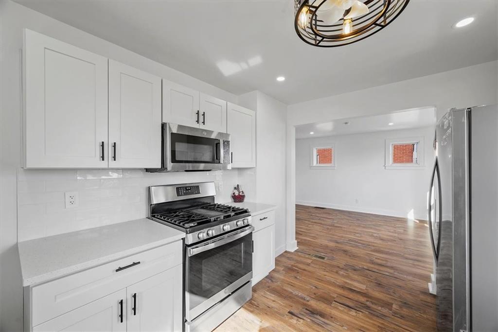 508 Maple Street West Mifflin, PA 15122 - Photo 11 of 31 a kitchen with cabinets and steel stainless steel appliances