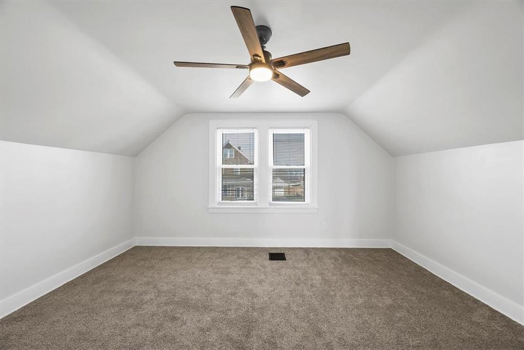 508 Maple Street West Mifflin, PA 15122 - Photo 16 of 31 an empty room with a window and a fan