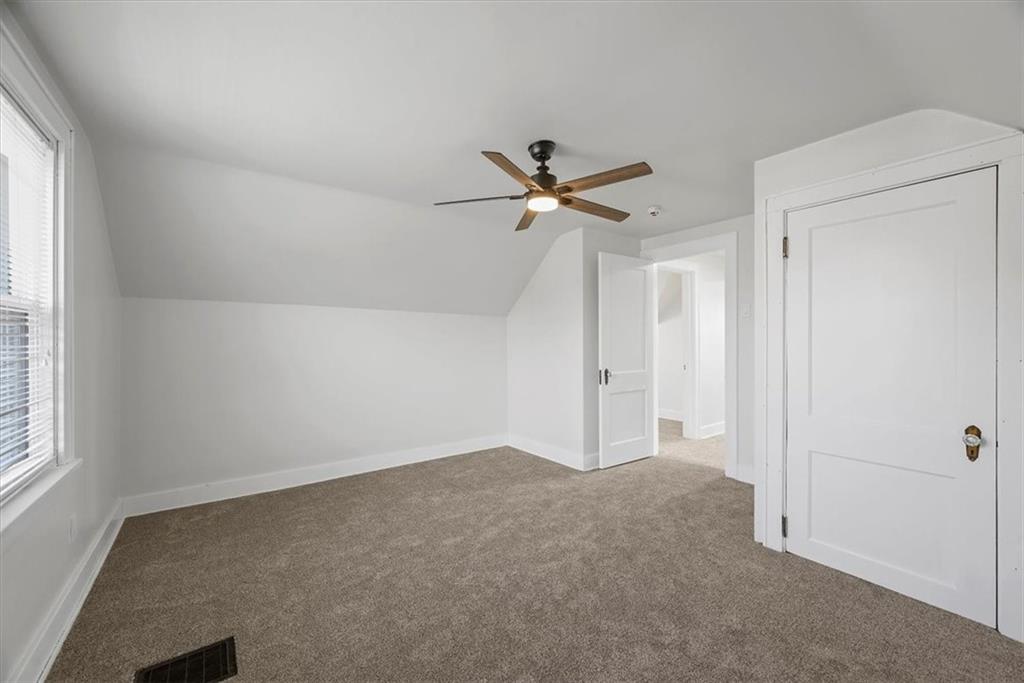 508 Maple Street West Mifflin, PA 15122 - Photo 17 of 31 an empty room with a window and a fan