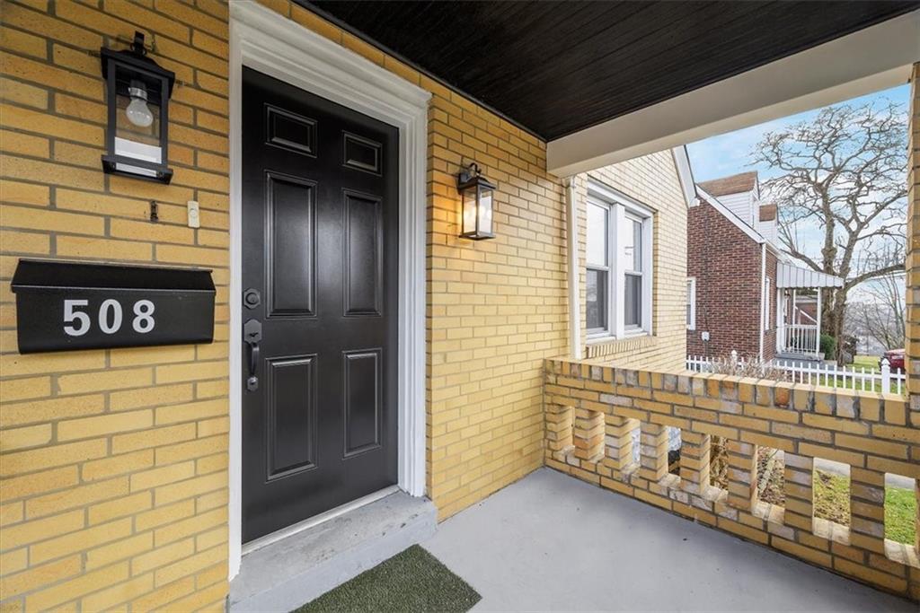 508 Maple Street West Mifflin, PA 15122 - Photo 2 of 31 a view of an entryway door front of a building