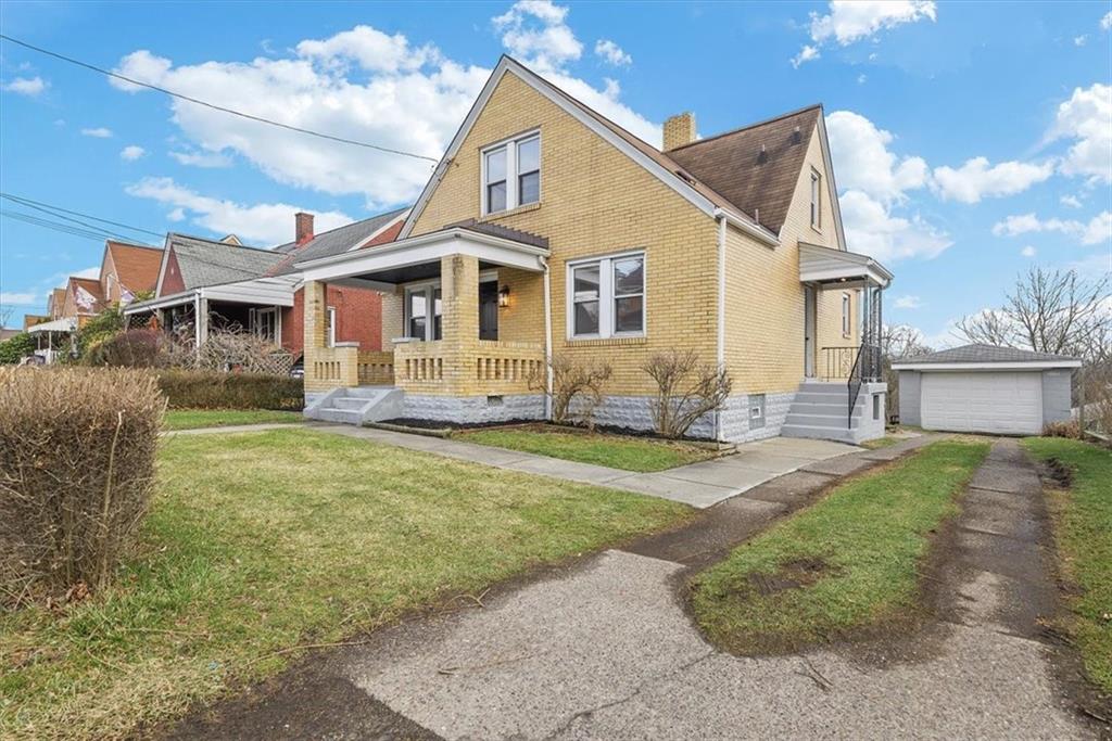 508 Maple Street West Mifflin, PA 15122 - Photo 4 of 31 a front view of a house with a yard