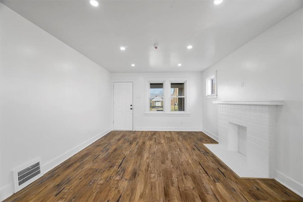 508 Maple Street West Mifflin, PA 15122 - Photo 6 of 31 a view of empty room with wooden floor and fan