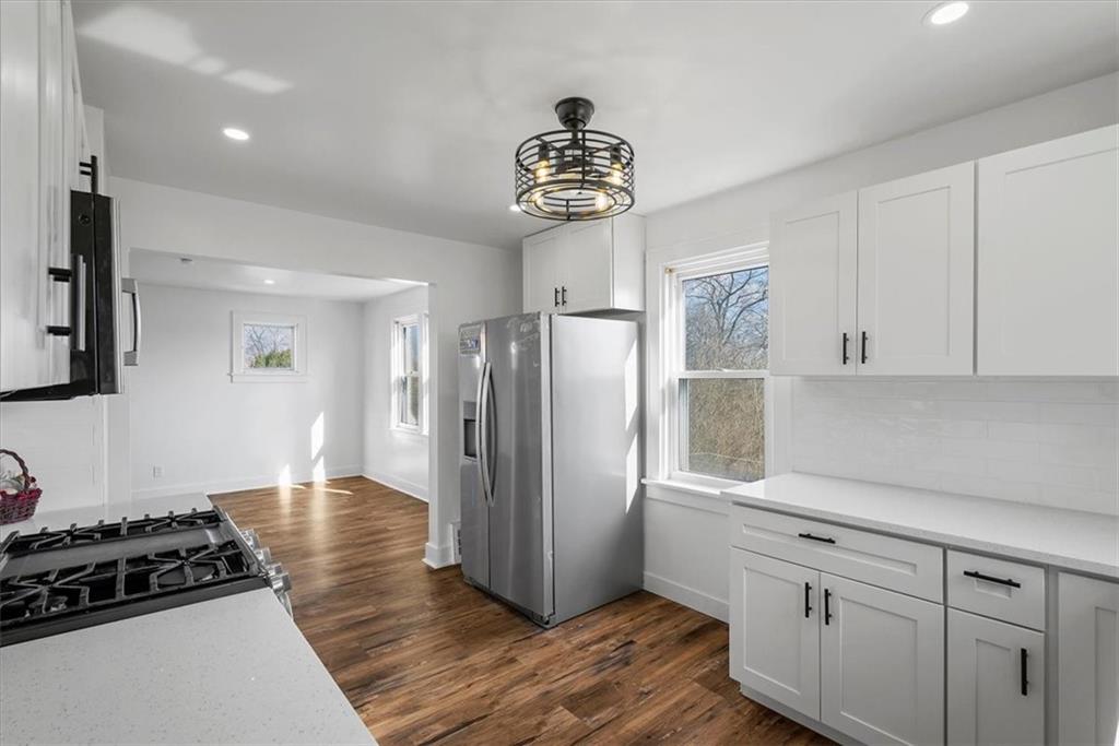 508 Maple Street West Mifflin, PA 15122 - Photo 10 of 31 a kitchen with stainless steel appliances a refrigerator sink and cabinets